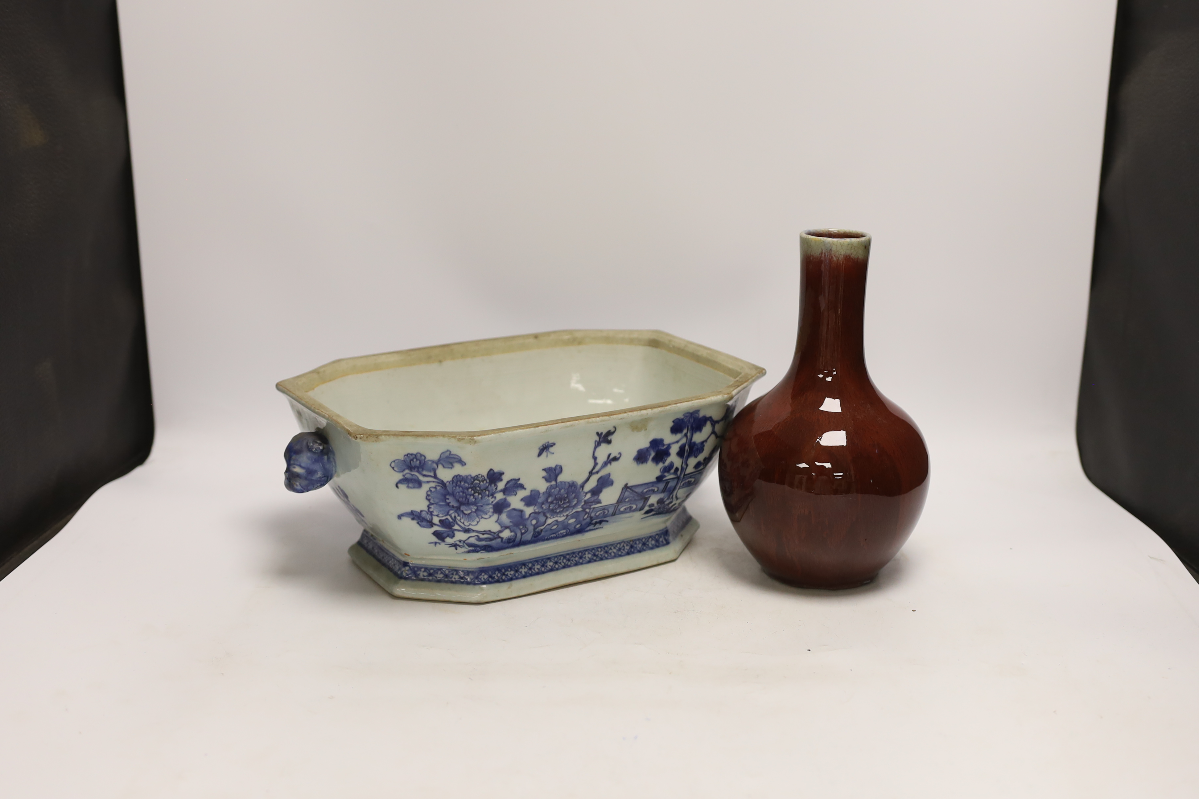 An 18th century Chinese blue and white tureen together with a sang de boeuf vase